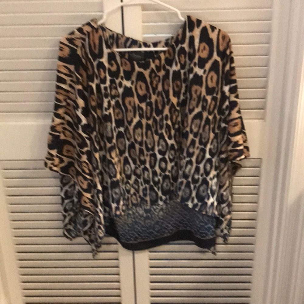 Top with attached cape